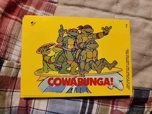 1989 Topps Teenage Mutant Ninja Turtles Serie 1 Sticker #7 Cowabunga SCHÖN - Bild 1 von 2