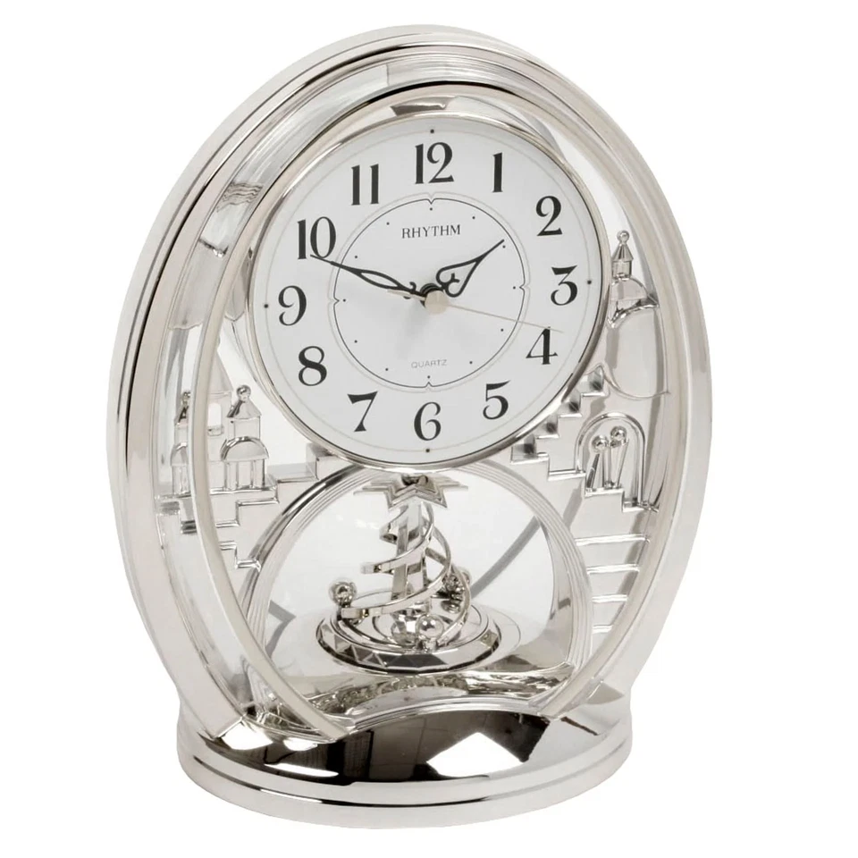 Rhythm Oval Mantel Clock With Pendulum - Image 1 of 1