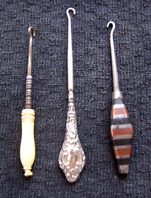 Three vintage button hooks early 20th century celluloid and silver plated (AAD) - Image 1 of 4
