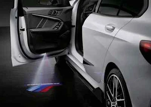 NEW GENUINE BMW M PERFORMANCE LED DOOR PROJECTOR SLIDES 63312469631 - Picture 1 of 6