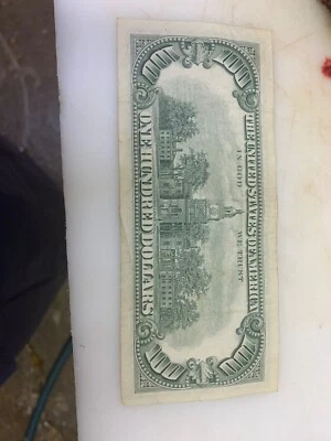 Billete de 100 dólares Foto 1 de 2