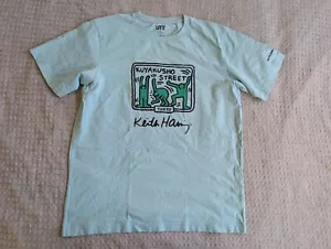 Uniqlo Keith Haring Shirt Erwachsene Medium grün Kuyakusho Street Japan Rundhalsausschnitt - Bild 1 von 10