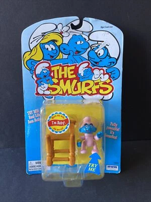 Figura Posable Los Pitufos Bebé Pitufo y Silla Alta 1996 Toy Island Nuevo en Paquete Sistema Operativo Foto 1 de 4