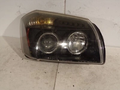 05 06 07 FARO DERECHO PASAJERO PROYECTOR DOBLE HALO NEGRO DODGE MAGNUM 18155 Foto 1 de 4