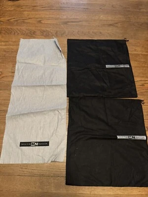 Lote de 2 bolsas antipolvo y tela con cordón Mark Nason Foto 1 de 4