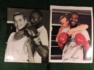 Boxer John Mugabi & Blonde GF signed TWO 8x10 Photos Boxing Champion Autograph - Picture 1 of 3
