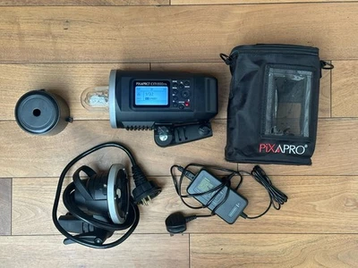 Pixapro CITI600 TTL Portable Flash w battery, bulb, charger, remote head & case - Image 1 of 4