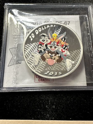 2015  RCM, Merrie Melodies  99.99 Silver 1.01 Tr Oz Proof  $20 Coin CMG PF-67 - Image 1 of 4
