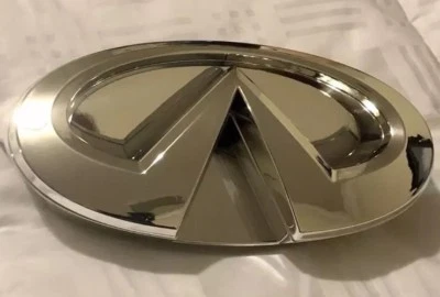 New OEM Infiniti G35 & G37 Sedan Front Grille Emblems W/ Housing 2007-2009 - image 1 of 4