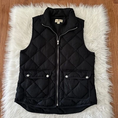 Chaleco acolchado Woolrich Down Puffer para mujer pequeño negro aislado cremallera completa Foto 1 de 4