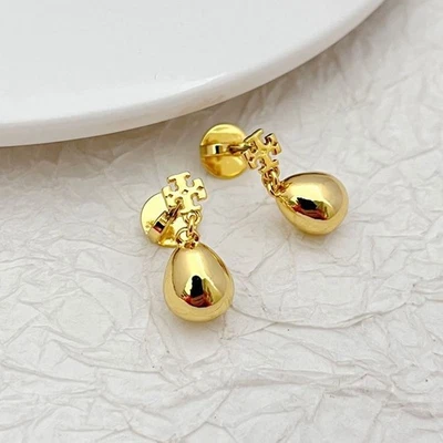 Nuevos Pendientes Tory Tiny Drop Oro con Bolsa para el Polvo con Bolsa para Joyas Tamaño: 1.9 * 0.8 cm Foto 1 de 4