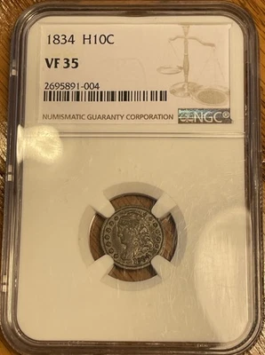 Media moneda de diez centavos busto tapado 1834 NGC VF35 muy fina Foto 1 de 4