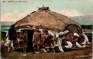 ESKIMOS and IGLOO Inuit Postcard - Picture 1 of 2