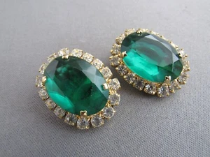 VINTAGE KIRKS FOLLY GOLD TONE CHUNKY GREEN OVAL RHINESTONE CLIPBACK EARRINGS - Picture 1 of 5