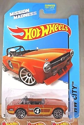 Hot Wheels Kroger Mission Madness 2014 4/4 HW City TRIUMPH TR6 marrón con 10 radios Foto 1 de 4