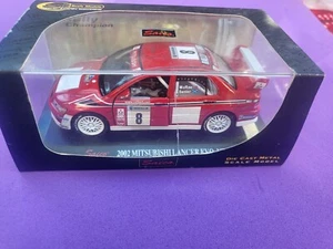 SAICO MITSUBISHI 1:32 LANCER EVO VII MCRAE NEU UND VERPACKT - Bild 1 von 3