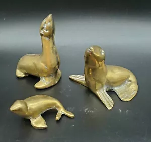 Tres estatuillas/sellas vintage de león marino de latón/criaturas marinas/familia - Imagen 1 de 7