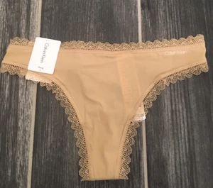NEW Calvin Klein Women's Lace-Trim Thong Panty Second Skin Silky Panties S Beige - Picture 1 of 4