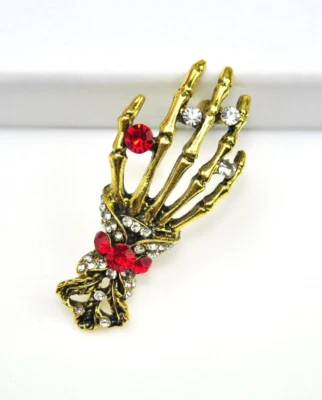 Broches de Halloween tono dorado esqueleto broche de mano diseño de dibujos animados joyería regalo Foto 1 de 4