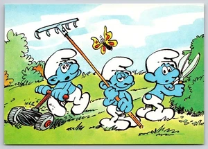 The Smurfs Mowing Lawn Trim Hedges Distracted Raking Postcard UNP 4x6 Slovakia - Picture 1 of 2