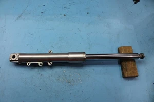 1467 09 HARLEY-DAVIDSON SOFTAIL FLSTF LEFT FRONT FORK SHOCK SUSPENSION DAMPER - Picture 1 of 9