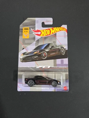 HOT WHEELS Themed - Chevy C6 Corvette (Corvette 70 1953-2023) 6/8 Black - Image 1 of 2