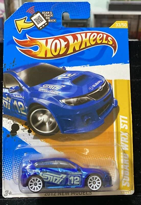 Hot Wheels Subaru WRX STI Blue 2012 NEW MODELS 33/50 in Card Protector - Image 1 of 4