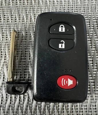 OEM 2010-2015 TOYOTA PRIUS SMART KEY KEYLESS REMOTE HYQ14ACX - Used Cut - Image 1 of 3