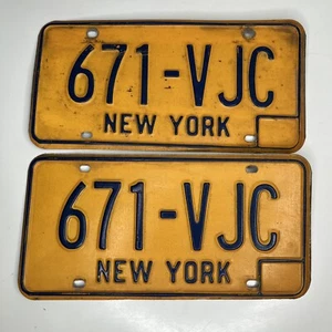 Vintage NEW YORK NY LICENSE PLATE TAG PAIR SET 671-VJC Yellow Blue - Picture 1 of 12