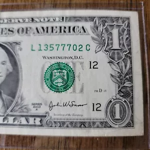 Billete de ángel de 1 dólar serie A 2003 con números primos L 13577702 C - Imagen 1 de 7