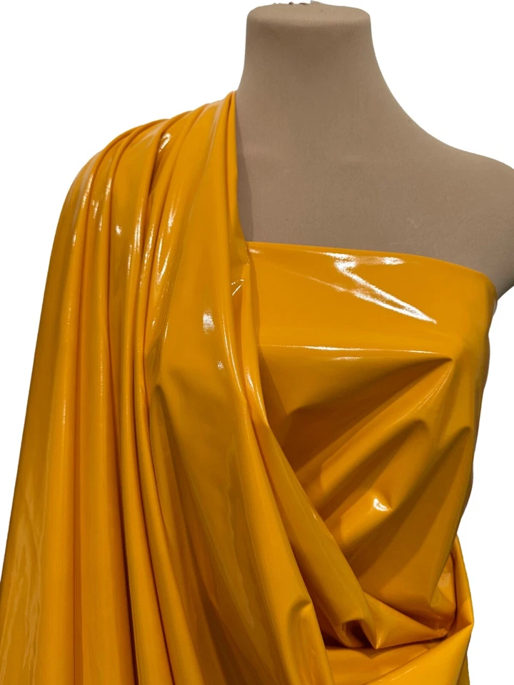 4 WAY STRETCH PU COATED GOLDEN YELLOW FABRIC.. SOLD BY THE YARD.. 58 " WIDE.. - Image 1 of 1