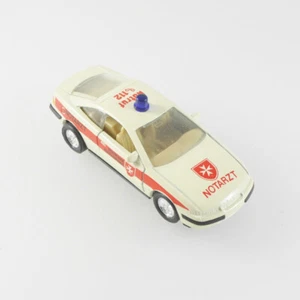 Welly 9041 - Opel Calibra - Malteser Notarzt - Mini-Flitzer mit Rückzugsmotor - Bild 1 von 5