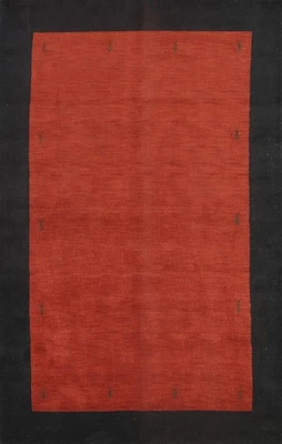 Alfombra de lujo roja oxidada hecha a mano de lana con borde negro para vida moderna 7x10 Foto 1 de 4