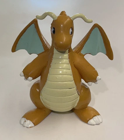 DRAGONITE 1-3/4" Pokémon NINTENDO Vintage. Stamped: CHINA C/G TOMY Cover