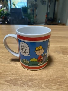 Taza de café UFS Golf Gift & Gallery Peanuts Snoopy Charlie Brown 1998 - Imagen 1 de 12