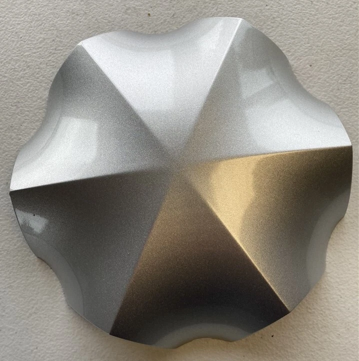 NOS OEM 1995-1999 Oldsmobile Aurora Wheel Trim Cap 25620005 Sparkle silver  - Image 1 of 3