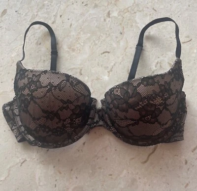 Sujetador Gilligan & O’Malley con aros ligeramente acolchado superpuesto de encaje negro 34C Foto 1 de 4