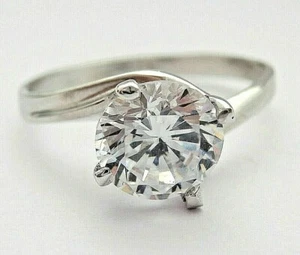 Anello stile Valentino con zircone solitario da 7 mm. e 4 griffes in ORO 18KT - Foto 1 di 11