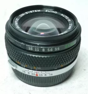 Olympus OM Zuiko Auto-W 3,5 21mm Objektiv An-Verkauf ff-shop24 - Bild 1 von 5