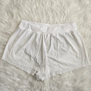 Pantaloncini ATHLETA Fast Route bianchi piccoli mesh running foderati leggeri sportivi - Foto 1 di 7