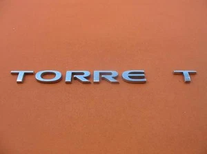 06 07 08 09 PONTIAC TORRENT TAPA TRASERA PUERTA CROMO EMBLEMA LOGOTIPO INSIGNIA SÍMBOLO 2 - Imagen 1 de 4
