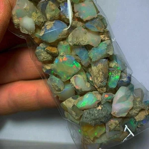 Piedra de ópalo en bruto de cristal de ópalo etíope sin cortar, variaciones de ópalo de fuego en bruto - Imagen 1 de 8