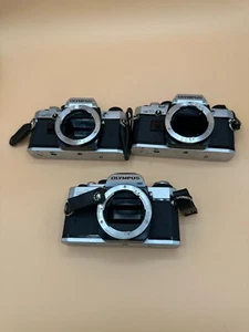 Lot of 3 Olympus 35mm Film Camera Bodies OM10, OMG for PARTS/REPAIR - Picture 1 of 7