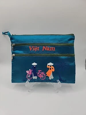 Bolso sin asas bordado con cremallera de Vietnam Bolso de maquillaje de seda Foto 1 de 4