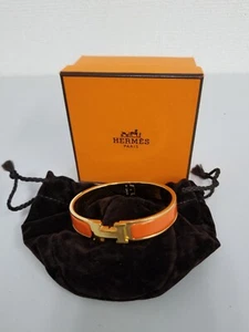 Bracciale Hermes usato metallo oro arancione Clic H accessori braccialetto 23298 - Foto 1 di 12