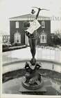 1969 Press Photo Paper Sign On Fountain Sculpture At Queens College Campus