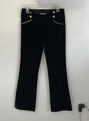 Pantalones acampanados Alice + Olivia de terciopelo negro con tubería dorada talla 6 Foto 1 de 4