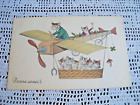 Anthropomorphic cats kittens flying plane New Years French Bonne Annee postcard