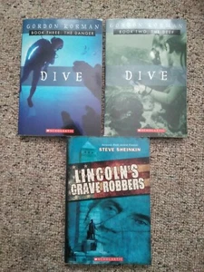 Gordon Korman 2 SC Book Lot & Steve Sheinkin - Lincoln's Grave Robbers - Picture 1 of 4