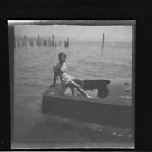 1950s candid of pretty woman on boat 2x2" photo Negative 2Cg9